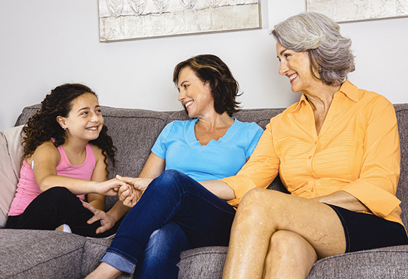 Family sitting on couch