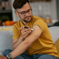 Man injecting insulin