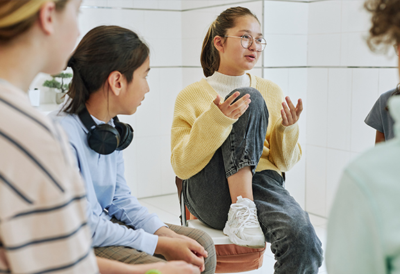 People talking in a circle diabetes support group