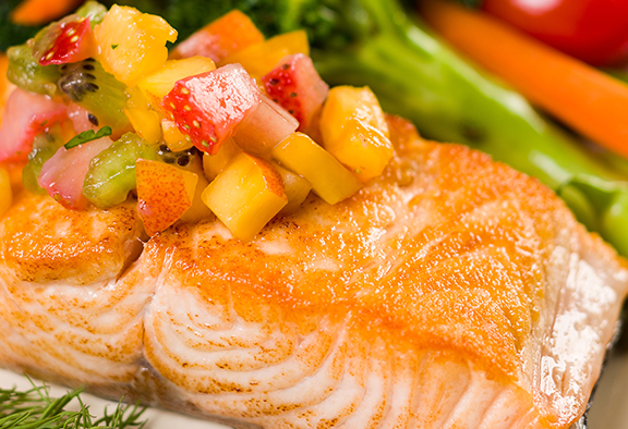 Salmon topped with fruit salsa