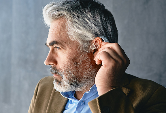 man with hearing aid